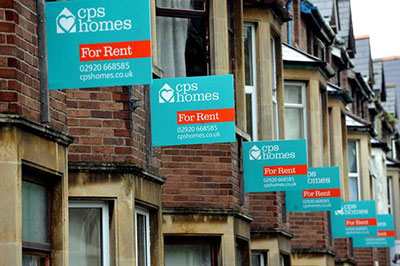 CPS Homes For Rent boards on terraced houses