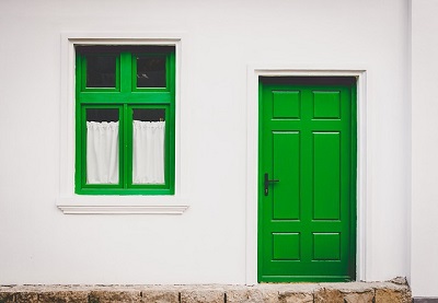 Property with green door and windows