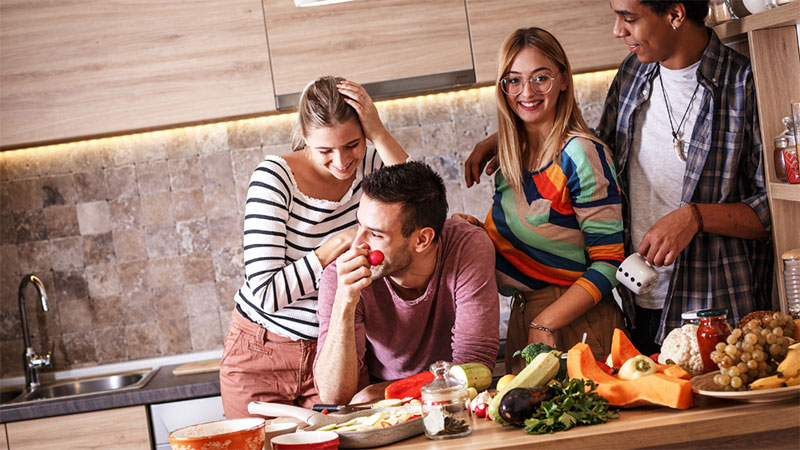 Family in Kitchen with food on counter