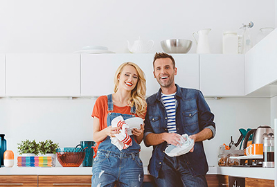 A couple in a kitchen