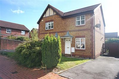 Photo of the front of a new build detached house