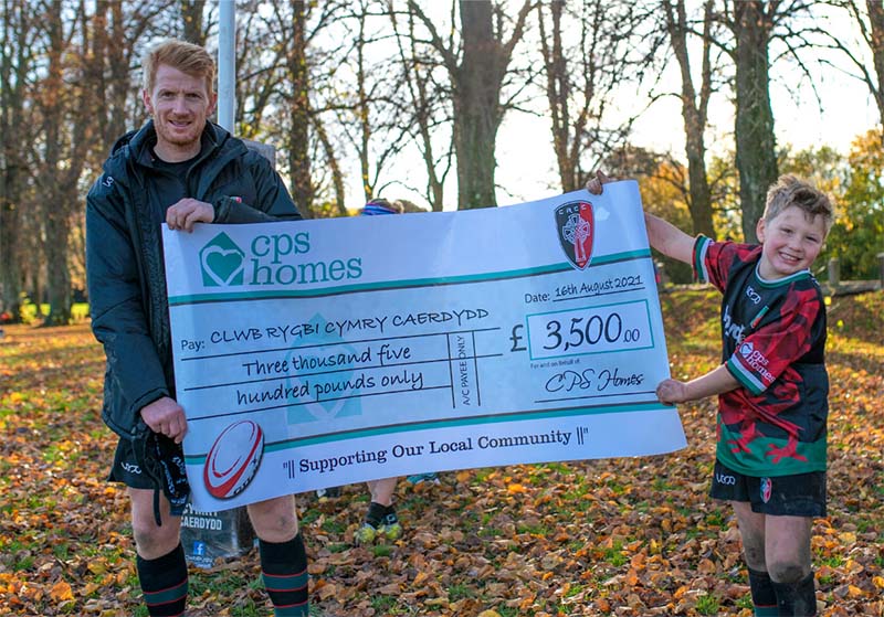 Rhys and Twm with giant CPS Homes sponsorship cheque