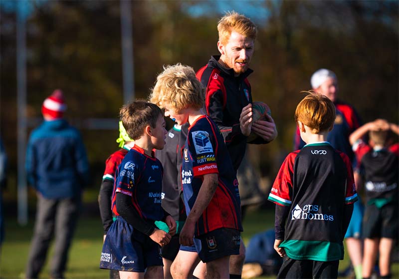 Rhys coaching the Clwb Rygbi team