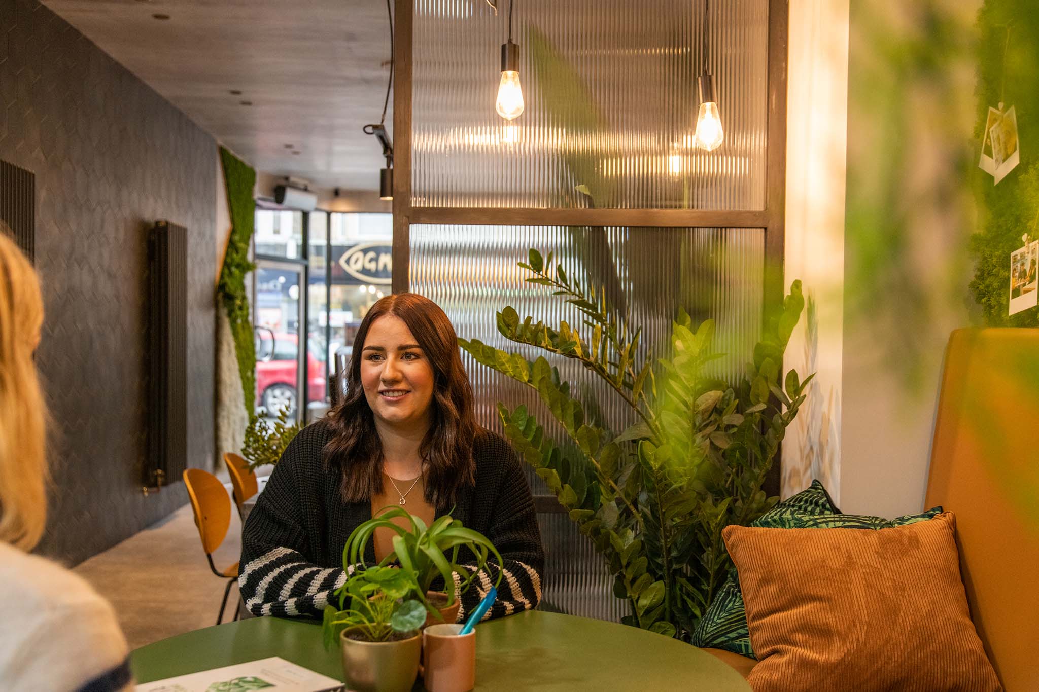 Interior of Roath with another staff member at a desk