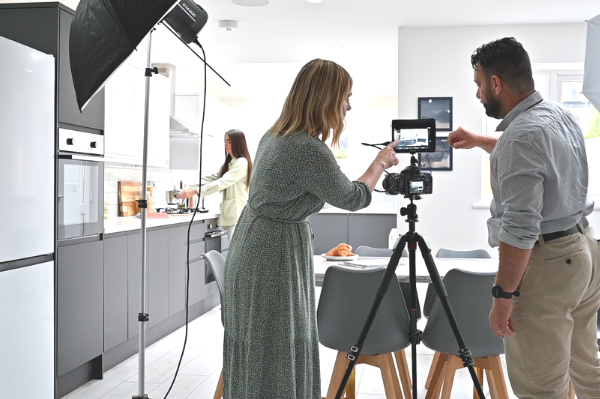 Setting up a photo shoot in a kitchen