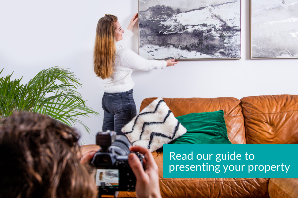 Adjusting a picture in a living room